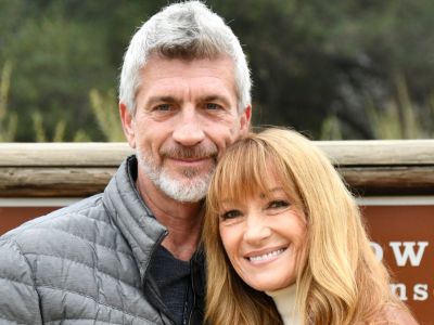 Joe Lando and Jane Seymour are side-hugging each other as they pose for the picture.